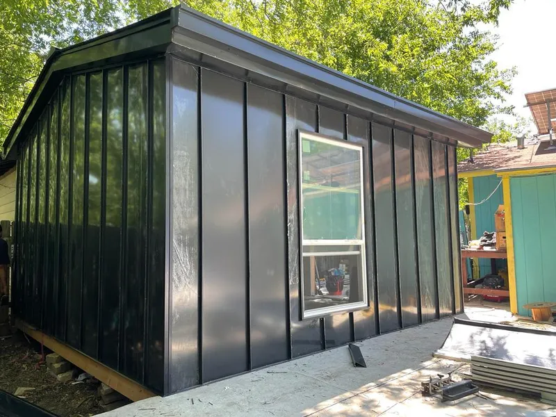 Black standing seam metal wall panels for Roof Inspection in Lochmoor Waterway Estates