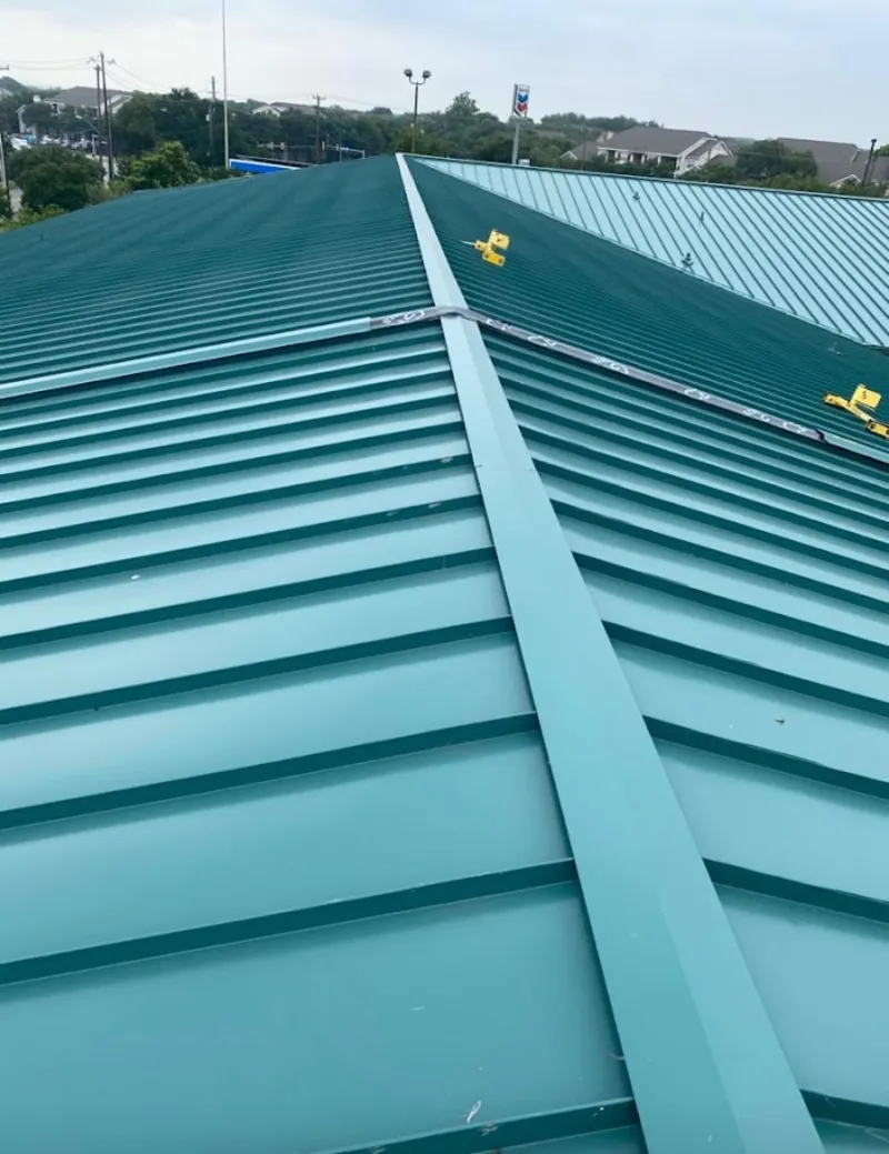 Green commercial metal roof ridge and valley for Metal Roof Repair in Lochmoor Waterway Estates